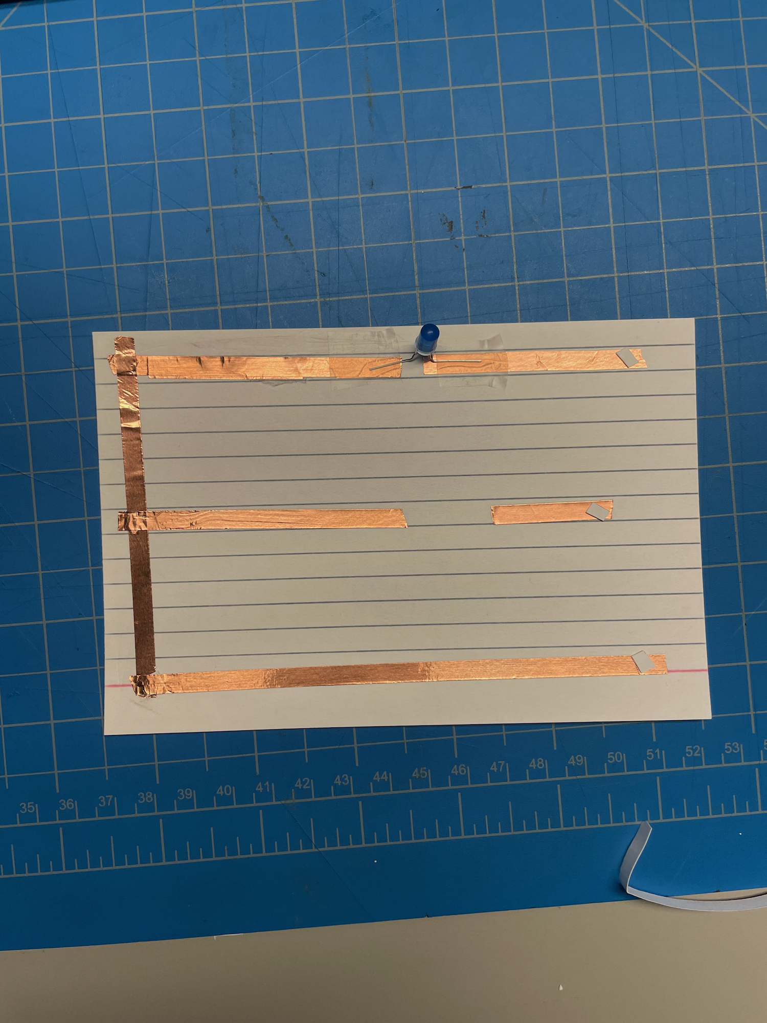 At displayed, this circuit almost is a combination of both the first and second parts. I 
                  tried a new way to connect the tape joints but it very much did not work. So, I resorted to 
                  my previous technique and then reflected on what other ways I could have tried to connect the 
                  different pieces of tape.